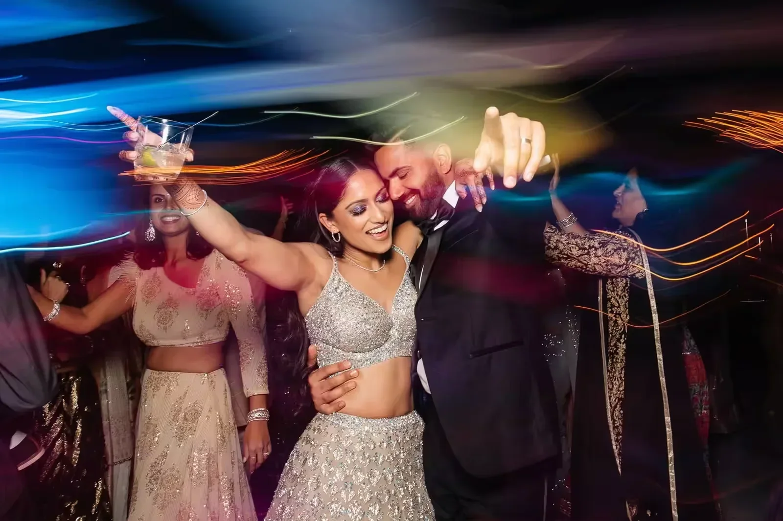 Indian, Pakistani & Punjabi wedding DJ and live dhol in Michigan, Desi Decibel Indian wedding DJ team and entertainment setup at a South Asian wedding