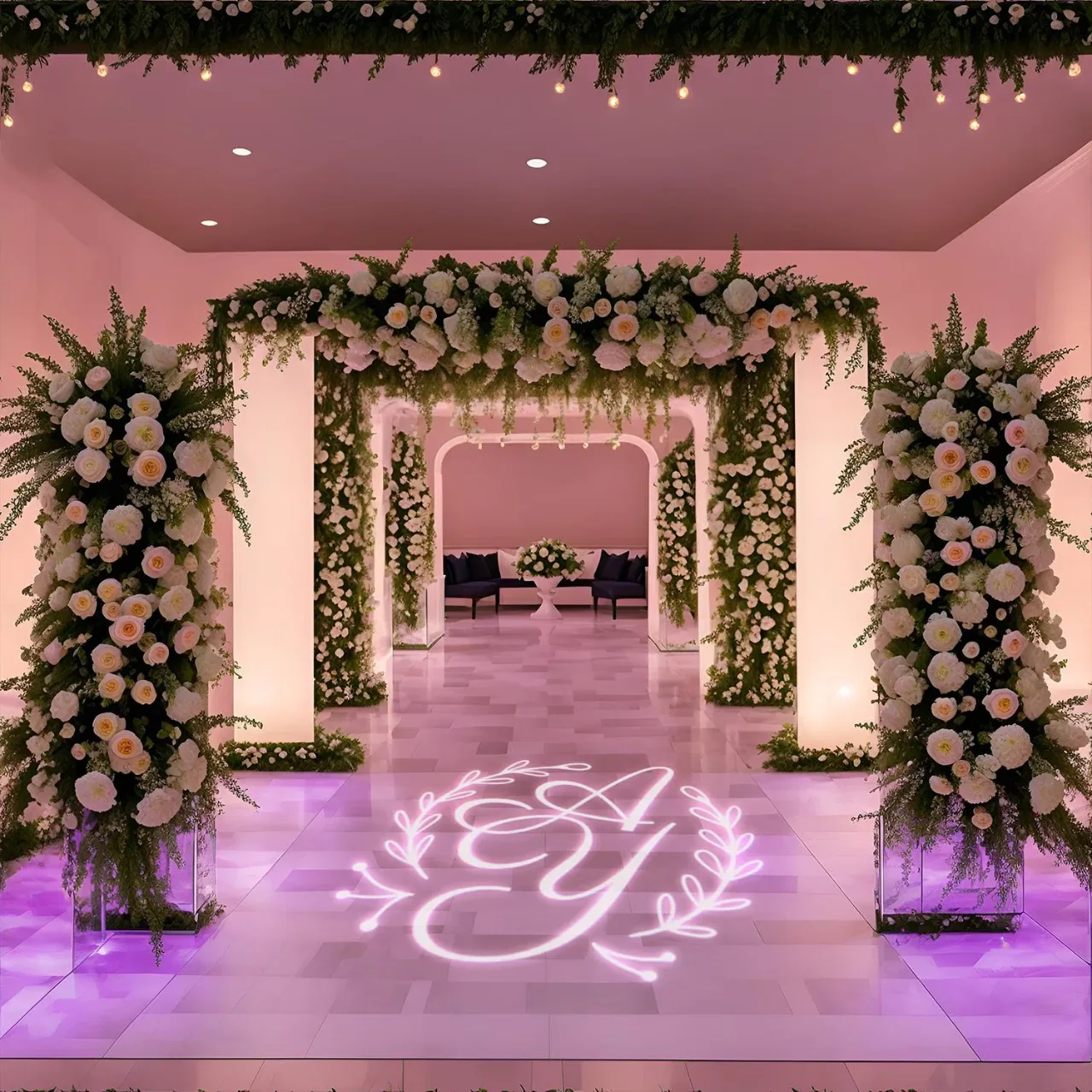 Lincoln Indian wedding DJ — Custom wedding monogram GOBO projection lighting on venue wall for Indian reception